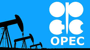 تصویر نماد اوپک و سه عدد استخراج کننده نفت